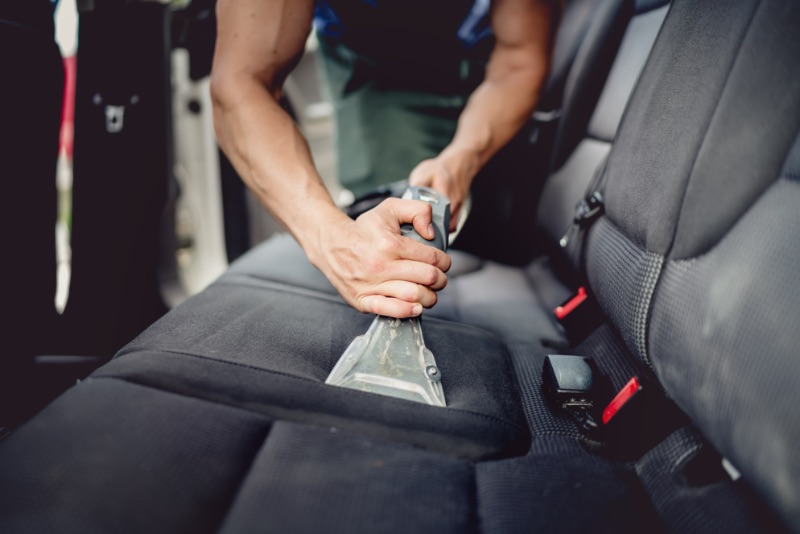 make ready for auto dealers' image of cleaning and vacuuming seats