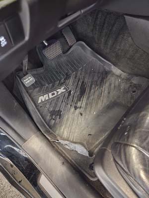 Acura MDX driver floor mats before