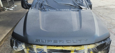 Ford Superduty after front hood spray-on liner